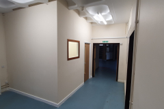 Plasterboard office wall with window and door